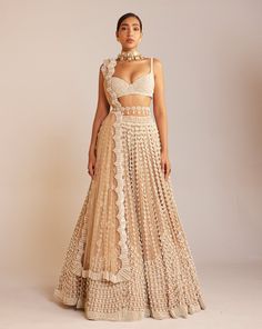 Beige pearl embellished lehenga paired with sweetheart neck pearl drop full sleeve blouse.From Vvani Vats Jhoomar's collection.DELIVERY TIMEPlease allow 8-12 weeks for your outfit to arrive.FABRIC DETAILSBlouse Georgette, Lehenga - Organza, Dupatta - Organza, Lining - Silk BlendProfessional cleaning only. DISCLAIMERHan Bollywood Style Beige Embellished Sets, Beige Bollywood Sets With Pearl Embroidery, Elegant Designer Lehenga With Pearl Embroidery, Designer Pearl Embroidered Elegant Lehenga, Designer Pearl Embroidery Lehenga, Elegant Semi-stitched Lehenga With Pearl Embroidery, Party Wear Festive Lehenga With Pearl Embroidery, Elegant Fitted Lehenga With Pearl Embroidery, Elegant Georgette Skirt Set For Reception