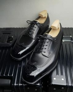 ❤️Discover the epitome of timeless style with our Black Leather Wingtip Oxfords, designed for the discerning gentleman who values sophistication and quality. These formal shoes are the perfect blend of traditional craftsmanship and modern flair, making them an essential addition to any refined wardrobe.❤️ ❤️Design and Craftsmanship❤️ 👉Premium Black Leather: Crafted from the finest black leather, these Oxfords exude a sleek and polished look, ensuring durability and a premium feel that only impr Black Wingtip Dress Shoes For Wedding, Black Wingtip Oxfords For Wedding, Elegant Oxfords With Goodyear Welt And Snip Toe, Elegant Oxfords With Snip Toe And Goodyear Welted, Elegant Oxfords With Snip Toe And Goodyear Welted Construction, Wingtip Oxfords With Rubber Sole For Wedding, Goodyear Welted Wingtip Dress Shoes For Wedding, Classic Black Oxfords For Wedding, Classic Wingtip Oxfords For Party