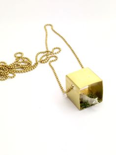 Delicate funny dioramas...a sheep dream! The pendant measures 1,5 cm, (0,5 inch). Antique tiny raw brass metal chain, 65 cm (26 inch). Or your desired length. Ready to ship! I hand make each piece using small miniatures and resin, each piece I make is unique. I will make sure yours is equally excellent. I will send the order packed in a recycled craft box, ready to gift! I ship through registered mail with the Spanish postal service. For more details please check up my policies and the discount A Sheep, How To Clean Metal, Soft Toothbrush, Resin Ring, Square Pendant, Brass Necklace, Craft Box, Brass Jewelry, Postal Service