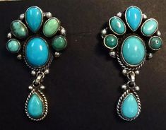 FEDERICO JIMENEZ TURQUOISE CLUSTER EARRINGS DESCRIPTION: This is an exquisite pair of earrings by legendary Oaxacan artisan Federico Jimenez. Federico always utilizes the finest natural turquoise, much of it from old mines and collections long since depleted.    FEDERICO JIMENEZ was born in Oaxaca, Mexico in 1941 in a Mixtec Indian Community.  He came to the USA in 1967 to study and work.  He studied jewelry making and design at the University Community School.  In 1970 He and his Wife Ellen Bel Millicent Rogers, Community School, Indian Culture, Taos, Cluster Earrings, Natural Turquoise, American Indian, Native American Jewelry, Heart Of Gold