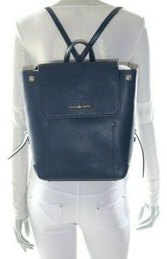 Details: Michael Kors Hayes Medium Backpack Navy/ Dark Khaki NWT348.00 STYLE: 35F8GYEB2M Hayes Color: variety of colors (please check stocks) Material: made with 100% Leather (exterior) Dimensions: 10” Width x 12” Height x 4.5” Depth Interior: 2 slip pockets Exterior: external back slip pocket Brand’s Logo: “Michael Kors” logo on flap closure Silver hardware with lock charm Bag Closure: magnetic snaps with side snaps Top Handle: 2.25” Bag Straps: adjustable straps Model Mannequin Life Size Detai Designer Leather Backpack With Gold-tone Hardware, Designer Leather Backpack For Shopping, Michael Kors Everyday Leather Backpack With Adjustable Strap, Designer Michael Kors Backpack With Adjustable Strap, Michael Kors Designer Backpack With Adjustable Strap, Michael Kors Leather Backpack For Everyday, Michael Kors Backpack With Detachable Strap For Everyday Use, Designer Backpack With Gold-tone Hardware For Everyday Use, Luxury Michael Kors Backpack With Detachable Strap