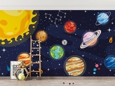 an image of a space themed wallpaper in a child's room with a ladder