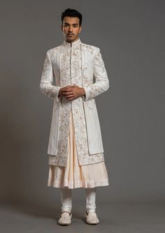 Men Ivory Hand Embroidery Jacket Style Floral Sherwani Designer custom made Ivory Hand floral fully embroidered jacket style floral sherwani with chudidar in UK . The latest heavy silk embroidered sherwani is best choice for groom . It is suited for Indian and Pakistani wedding wear . #wedding #weddingdress #weddingdresses #sherwani #sherwanidress ##marriagedress #weddingoutfits Embroidered Sherwani, Embroidery Jacket, Sherwani For Men, Wedding Sherwani, Indian Groom, Silk Wedding, Indian Wedding Dress, Groom Style