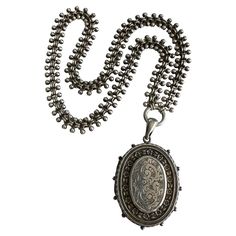 Details: Victorian Aesthetic Movement large ornate silver locket, with sweet forget-me-not flower details. A beautiful floral frame and engraved abstract swirl pattern and beaded details adorn the front of the locket, while the back is solid silver. The locket has no markings, and dates back to the late 1880's The locket opens easily, and there are two areas that you can add a photo. The clasp is secure, and stays shut. Please ask all necessary questions prior to placing an order! Measurements: Chain Aesthetic, Moonstone Necklace Silver, Victorian Pendant Necklace, Chains Aesthetic, Festoon Necklace, Victorian Locket, Forget Me Not Flower, Victorian Aesthetic, Art Nouveau Pendant