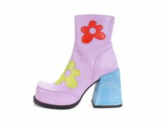 There’s no shortage of flowery fun when it comes to the powerfully playful Vogtalk Rory. With floral applique pieces that some may recognize from the Picnic Riverdale, an inside zipper, and a stacked leather heel expertly dyed and painted by hand*, these cute, chunky boots speak for themselves — though you’ll likely find yourself praising their lovely details to everyone you meet. Walk the talk. Nappa leather Inside zip Tunite soles 1” platform 4” ABS heel wrapped in painted stacked leather with Floral Shoes Heels, Multicolor Platform Boots With Round Toe, Gogo Boots Purple, Dark Purple Platform Boots, Painted Heels, Multicolor Synthetic Platform Boots, Hand Painted Heels, Kidcore Platform Boots, Walk The Talk