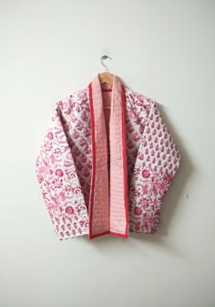 "Pink Floral Kantha Coat, Handmade Cotton Kantha Jacket, Vintage Kantha Short Jacket, Ladies Winter Coat, Front Open Jacket, Indian Kantha Quilt Jacket, Bohemian Kantha Jacket, Quilted Jacket Size:-One size (plus) US women's letter Measurements: Length: 26\" Inches Chest: 44\" Inches Sleeve: 22\" Inches Fabric - 100% Pure Cotton Color : Same As Picture Kantha Jacket made with kantha quilt fabric which is fresh and new. This kantha fabric is hand stitched and it is the specialty of this piece. Th Reversible Jacket Women, Traditional Pink Cotton Outerwear, Long Sleeve Cotton Nehru Jacket For Spring, Ladies Winter Coat, Kantha Coat, Bohemian Quilt, Kantha Fabric, Kantha Jacket, Party Attire