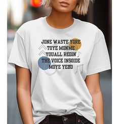 a woman with blonde hair wearing a white t - shirt that says,'tone waste your