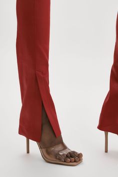 Your go-to leather pants get a sleek new update. Cut from supple stretch lamb leather with a second-skin fit, they feature a high waist and straight leg with a side split hem for an edgy flair. Wear with everything from casual t-shirts to bodysuits. Swim Accessories, Side Split, Split Hem, Ruby Red, Second Skin, Skirt Pants, Casual T Shirts, Dress Accessories, Short Pants