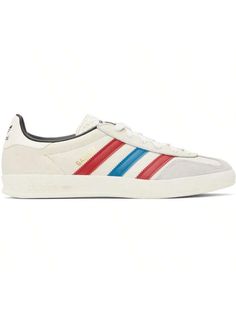 adidas Originals 
Off-White Gazelle Indoor Sneakers 
Low-top paneled buffed leather and suede sneakers in off-white. 
. Lace-up closure 
. Logo embossed at faux-leather tongue 
. Paddedllar 
. Signature serrated stripes at sides 
. Text stamp at outer side 
. Logo ped at heel tab 
. Buffed leather lining 
. Treaded rubber sole 
Supplierlor: Chalk white/Better scarlet/Core black 
Upper: leather, synthetic. Sole: rubber. 
Made in Viet Nam. 
242751M237022 
Originals | Off-White Gazelle Indoor Sneak White Gazelle, Casual Athletic Shoes, Chalk White, Suede Sneakers, Outdoor Shoes, Scarlet, Low Top, Adidas Originals, White Lace