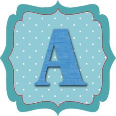 the letter a is made up of blue fabric with white dots and red trim on it