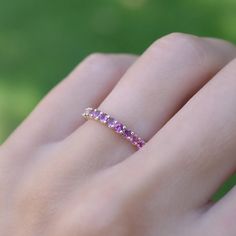 *Metal : 925 Sterling Silver *Main Stone : Natural Pink Tourmaline *Stone Shape : Round *Stone Weight : 1.10 Ct *Size : 2 mm *Band Width : 2.20 mm *Birthstone Month : May *Personalization : Possible * Free engraving is available on this product *Occasion : Wedding, Engagement, Birthday, Anniversary *For custom making jewelry, it can be made with gold also Solid gold, including 14/18k white/yellow/rose gold. Sent in a very elegant wedding ring box, ready for one special lady. Customization is alw Tourmaline Wedding Band, Elegant Wedding Rings, Month May, Stacking Bands, Wedding Ring Box, Half Eternity Band, Tourmaline Stone, Matching Band, Eternity Band