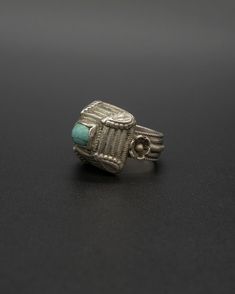 Channel the ancient power and symbolism of turquoise as a talisman of kings, shamans, and warriors with this stunning vintage silver dome-shaped turquoise ring. Let the energy of turquoise bring you luck, wisdom, and a sense of peace as you wear this unique piece. This item will ship directly from Bali via DHL delivery. Please allow up to 15 business days to arrive. Bohemian Engraved Turquoise Ring For Gift, Engraved Bohemian Turquoise Ring, Traditional Turquoise Rings Collectible, Adjustable Traditional Turquoise Ring, Traditional Silver Turquoise Ring, Mala Bracelet, Mala Necklace, The Energy, Healing Stones