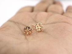 Celebrate special moments with snowflake stud earrings in 14k solid gold. These 18k rose gold dainty post earrings are perfect for women, making a thoughtful birthday gift for a girl or a cherished gift for mom. Their delicate design adds a touch of winter magic to any outfit, year-round. Item Dimension:- Metal: Solid Gold Earrings Size: 8mm Metal Weight: 9kt 1.1Gram, 1.3 gram in 14kt, 1.6 gram in 18kt Approx THIS ALL DESIGN IS CRATED BY "GoldGlowJewels" Etsy is a global online marketplace, wher 14k Rose Gold Earrings As Gift, 14k Rose Gold Round Earrings As Gift, Dainty Rose Gold Earrings As Gift, Rose Gold 14k Gold Earrings Gift For Her, Rose Gold 14k Gold Earrings As Gift, Rose Gold 14k Gold Earrings For Gifts, Gold Earrings For Women, Solid Gold Earrings, Winter Magic