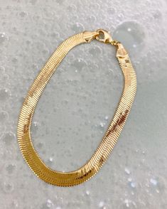 A beautiful sleek golden herringbone strand you can wear everyday 14k gold filled  7.5” inch total length   Layers perfectly Gold Snake Chain, Jewelry Cleaning Solution, Snake Chain Bracelets, Gold Snake, Small Jewelry, Bracelet Gold, Modern Fashion, Monte Carlo, Accessories Unique