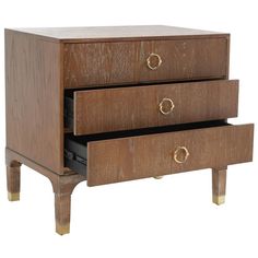 a wooden dresser with two drawers and gold handles