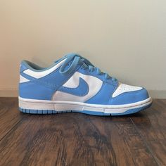 These Are The Nike Low Dunk University Blue. They Are Sized Big Boys 6.5 Youth. They Are Practically Brand New. They Have Only Been Worn Once. There Are No Scratches Or Tears. Casual Light Blue Skate Shoes For Streetwear, Light Blue Slip-on Sporty Sneakers, Casual Light Blue Lace-up Skate Shoes, Light Blue Skate Shoes For Streetwear With Round Toe, Light Blue Round Toe Skate Shoes For Streetwear, Blue Mid-top Skate Shoes With Laces, Light Blue Round Toe Skate Shoes With Rubber Sole, Light Blue Skate Shoes For Streetwear, Blue Mid-top Lace Skate Shoes