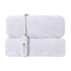 two white pillows with an electronic device attached to them