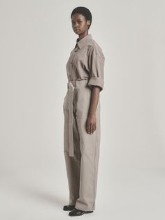 Take off-duty dressing to the next level with UNI FORM’s Utility Pants. They’re made in South Africa from tobacco-hued cotton and have a comfortable, relaxed fit that makes them extra versatile. Designed to sit high on the waist, they’re finished with roomy patch pockets and an adjustable belt for a flattering touch. Make sure to tuck your shirt or blouse in. - High rise, concealed zip fly, adjustable belt, patch pockets, full length - Cotton - Crafted locally with natural fibers - Each piece is Tuck Your Shirt, African Luxury, Cotton Crafts, Utility Pants, Adjustable Belt, Off Duty, Natural Fibers, Patch Pocket, South Africa