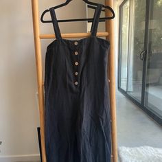 Black Zara Linen Jumpsuit In Size S. Never Worn. Slightly Oversized. Faux Buttons In Front. In Excellent Condition. Black Summer Jumpsuit With Button Closure, Black Overalls With Buttons, Black Overalls And Rompers With Buttons, Black Jumpsuits And Rompers With Buttons, Chic Black Jumpsuits And Rompers With Buttons, Zara Black Jumpsuits And Rompers For Summer, Linen Jumpsuit, Zara Pants, Black Jumpsuit