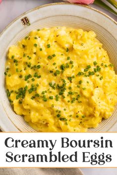 creamy boursin scrambled eggs in a white bowl