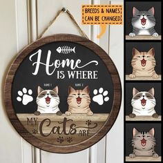 a wooden sign that says home is where my cats are