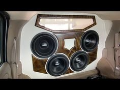 the inside of a car with speakers on it