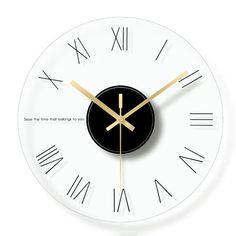 a white clock with roman numerals on the face and numbers in gold hands