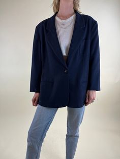 "- Brand: Haberdashery - Navy blue blazer jacket  - Wool nylon blend - Acetate lining  - Shoulder pads - Tagged 18P Chest: 22\" Length: 29\"  Sleeve: 21\" Model is 5'7, typically wears a size small and is a 26\"-27\" waist. Measurements are taken seam to seam while lying flat and are not doubled. Please refer to measurements to ensure proper fit. Due to the nature of Vintage goods there may be minor flaws or imperfections. These add to the beauty and uniqueness of each item. All sales are final. When you are ready to purchase please read our shop policies. Model is 5'7, typically wears a size small and is a 26\"-27\" waist. Measurements are taken seam to seam while lying flat and are not doubled. Please refer to measurements to ensure proper fit. Due to the nature of Vintage goods there ma Blue Career Blazer With Notch Lapel, Career Blue Notch Lapel Blazer, Career Notch Lapel Blue Blazer, Classic Blue Career Blazer, Blue Career Blazer With Suit Collar, Blue Career Blazer For Fall, Blue Blazer For Career In Fall, Blue Blazer For Career And Fall Season, Blue Blazer For Career In Fall Season