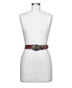 A large oval buckle with jeweled-toned stones makes this belt a standout. With a peg to secure it, you can cinch this beautifully crafted woven belt as tightly or loosely as you'd like. Show off your sense of style with the Marula. 100% full-grain leather, semi-precious stones, acrylic, enamel Peg buckle Signature brushed metal hardware, heavy handcrafted stitching S: 34-40" length, 1-3/4" width M: 38-44" length, 1-3/4" width L: 42-48" length, 1-3/4" width Rope Rings, Satchel Backpack, Ocean Jewelry, Jewelry Candles, Woven Belt, Leather Denim, Western Belts, Rose Jewelry, Belt Accessories