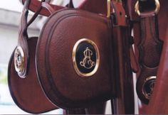 a close up of a horse's saddle with the initials and numbers on it