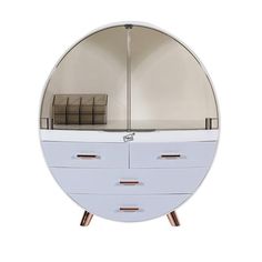 an image of a round mirror with drawers