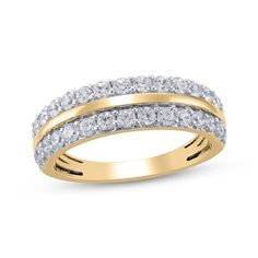 a yellow gold ring with two rows of diamonds