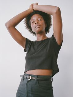 The Lou is our version of the classic boy tee, with a narrow fit in the shoulders and a slight crop (the perfect counterpart for high-waisted denim). Made from 100% silk noil, it’s the perfect-fitting, super-soft staple you always reach for; designed to get better with age and distinguished by the specific, perfectly imperfect nubby texture of raw silk. Urban Black T-shirt With Ribbed Cuffs, Black Soft-washed Crew Top, Black Moisture-wicking Muscle Tee, Sporty Relaxed Fit Washed Black T-shirt, Black Soft-washed Relaxed Fit T-shirt, The Undone, Silk Noil, Boy Tees, Perfectly Imperfect