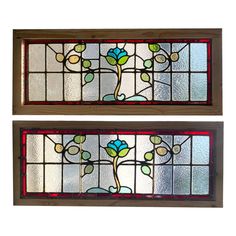 two stained glass windows with flowers and leaves on them, one in the same color as the other