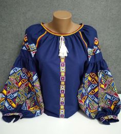 Royal blue embroidered blouse Geometrical pattern blouse Boho style puff sleeves shirt Modern Ukrainian vyshyvanka is a trendy thing in any country. This blouse is made on a high quality homespun cotton. Note, that it contains synthetic fibers (less than 30%) for softness, gentle touch and long-term life. It's comfortable due to the quality materials and stylish cut, original because of bright and unique embroidery patterns. The blouse is the perfect combination of modernity and tradition. You c Embroidered Blouses, Peasant Shirt, Mexican Blouse, Puff Sleeve Shirt, Gorgeous Blouses, Mode Boho, Chic Blouses, Folk Fashion, Blue Embroidery