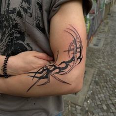 a person with a tattoo on their arm