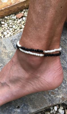 "Your anklet will be made custom just for you so please select your size. If you would like a length not listed just click \"different size\" and let me know what length you would like. your choice; 1) black seed beads with cream colored seed beads 2) cream colored seed beads with black seed beads Like the style but looking for a different color combination, just message meI may have just what your looking for :) Please select your desired anklet length If you are not sure of what size you need Black Beaded Bracelets For Summer Gifts, Handmade Black Anklets For Summer, Handmade Black Summer Anklets, Adjustable White Ankle Wrap Bracelet, Black Beaded Bracelets For Summer With Round Beads, Summer Adjustable Beaded Bracelets With Black Beads, Black Beaded Anklets For Festival, Black Bohemian Anklets With Black Beads, Black Beaded Festival Anklets