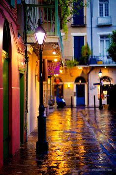 an empty street at night in the rain