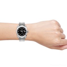 This exquisite Women's Diamond Watch Rolex Datejust 26mm Black Dial W00412 is the perfect accessory for any woman. The stainless steel bezel and bracelet are both durable and stylish, while the 26mm case diameter and 7 inch strap length make it comfortable to wear. The black dial is adorned with diamonds, adding a touch of elegance and sophistication. The sapphire crystal is scratch-resistant and the automatic movement ensures accurate timekeeping. The engravable case back makes this watch a per Casual Elegant Style, Diamond Watches Women, Rolex Watches Women, Watches Women, Women Diamond, Diamond Watch, Rolex Datejust, Sapphire Crystal, Rolex Watches