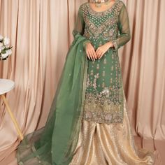 3 Piece Suit: Green Organza Shirt With Heavy Embellishment Work (Zardozi, Raysham, Etc) + Inner Gold Tone Sharara Organza Dupatta Size: Sewn To Standard Sizing, May Need Altering To Fit You Better Ordered As An L, Probably A Us8/10 New & Never Worn Green Indian Suit, Green Pakistani Suit, Indian Lengha, Green Lehenga Choli, Pakistani Lehenga, Net Shirt, Gold Lehenga, Indian Suit, Red Bridal Dress