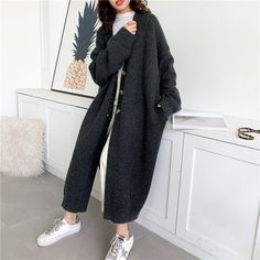 Brand Name: EAMStyle: CasualMaterial Composition: AcrylicDecoration: NONEPattern Type: SolidClothing Length: RegularCollar: V-NeckOrigin: CN(Origin)Season: WinterSleeve Length(cm): FullSleeve Style: RegularMaterial: COTTONThickness: STANDARDClosure Type: Open Stitchitem number: Y20413color: 3 colorsSeason: Autumn Winter Gray Long Knitted Sweater Coat, Long Gray Knitted Sweater Coat, Long Gray Sweater For Fall, Gray Long Sweater For Fall, Gray Long Winter Sweater, Gray V-neck Knit Outerwear, Gray Knit V-neck Outerwear, Gray Knitted V-neck Outerwear, Trendy Oversized Gray Sweater Coat