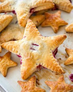 star shaped pastries on a baking sheet ready to be baked