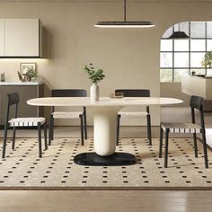 a white table and chairs in a room