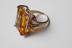 Large Citrine Treated Cocktail Ring  Length of stone 23mm and the width is 15mm 14K Yellwo Gold Size: 7.5 Formal Amber 14k Gold Ring, Formal Rings With Faceted Rectangular Stone, Formal Rectangular Citrine Ring, Formal 14k Gold Faceted Topaz Ring, Formal Orange Rectangular Jewelry, All That Glitters, Cocktail Ring, Cocktail Rings, Rings Statement