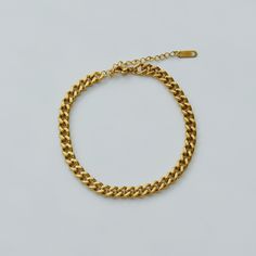 "Brand new. Selling one piece of the curb chain anklet. Three styles are available. You may wear it as a single anklet or layer it up with other anklets, creating a bold and chunky style. The first photo is wearing an 8mm width chain. Material: 18K gold plated titanium Width: 8mm / 0.31\", 6mm / 0.23\" and 3mm / 0.11\" Total length: 8\" / 21cm plus 2\" / 5cm extension link Q&A 1. What is the material? - It is made from 18K real gold plated titanium. Titanium is nickel-free, zinc-free and hyp Minimalist Cuban Link Chain Bracelet, Minimalist Adjustable Chain Anklet, Everyday Gold Chain Anklets, Twisted Band Ring, Stacked Necklaces, Minimalist Women, Twisted Band, Gold Snake, Chain Anklet