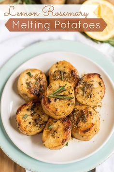 lemon rosemary melting potatoes on a white plate with the title overlay reads lemon rosemary melting potatoes