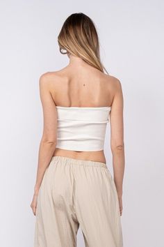 You deserve some extra attention in the Ashley White Ribbed Tube Top! Cute ribbed knit tube top with overlapped straight neckline and cropped bodice. Style with distressed high-waisted shorts for a fun vacation look! DETAILS & CARE 50% Viscose, 28% Polyester, 22% Nylon. Hand Wash Cold. Imported. Tube Too, Ribbed Tube Top, Distressed High Waisted Shorts, Knit Tube Top, Ashley White, White Tube Top, Cream Pants, Boho Pink, Vacation Looks