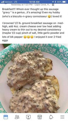 two pieces of bread covered in gravy on top of a green and white plate