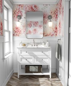 a bathroom with a sink, mirror and towel rack in it's wallpaper