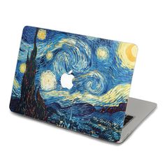 an apple macbook air laptop with the starr night painting on it's cover